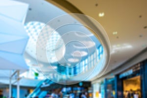 Customer store blurred background. People shopping in modern commercial mall center. Interior of retail centre store in soft focus