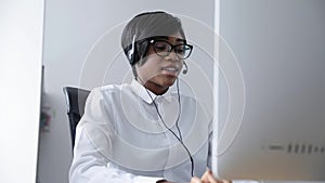 Customer Support. Afro-American Woman Working In Call Center