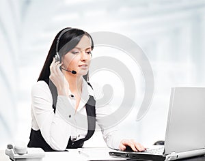 Customer support operator working in a call center office