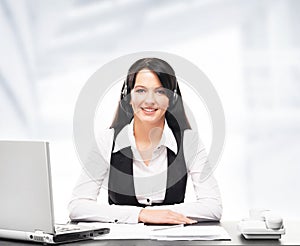 Customer support operator working in a call center office