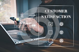 Customer Survey Feedback and Satisfaction Service Concept. Woman`s Hands is Choosing Rate of Satisfaction Evaluation for Customer