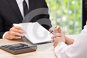 Customer or woman make a decision to sign a contract when businessman giving pen