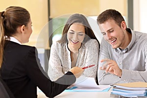 Customers ready to sign a contract at office photo