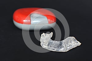 Customized transparent dental teeth bite guard clear aligners for lower jaw in front of blurry case