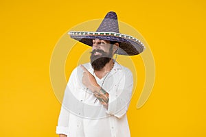 Customs and culture. Guy cheerful festive mood at party. Man in mexican hat. Explore heritage on your paternal line photo