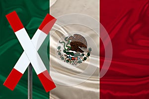 Customs sign, stop, attention on the background of the silk national flag of mexico country, concept of border and customs control