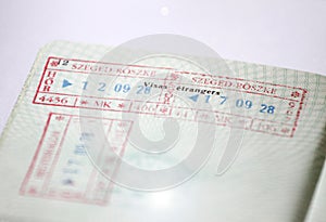 Customs stamps in international passport for traveling around the World. Document for traveling. Stamps and visas.