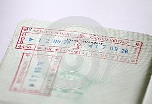 Customs stamps in international passport for traveling around the World. Document for traveling. Stamps and visas.