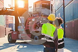 Customs team container control loading staff worker working together at port containers yard for shipping management concept