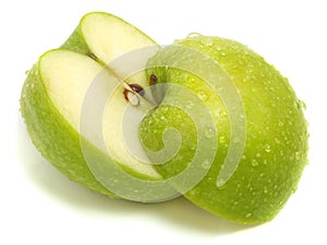 Cut apart fresh green apple photo