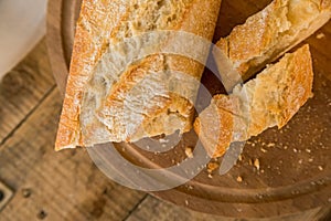 Cut baguete on cutting board