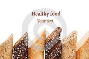 Cut baguette bread of different varieties on a white background. Rye, wheat and whole grain bread. Isolated. Decorative frame of