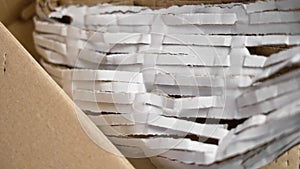 Cut Cardboard Filling from Recycled Paper for Parcel Posts. Rotation.