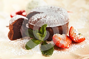 Chocolate fondant with vanilla ice cream and strawberry