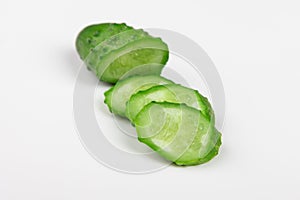 The cut cucumber with the knife