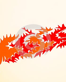 Cut and distorte shapes in the colours red and orange.