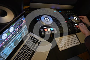 Cut in of DJ Decks and Laptop Computer photo