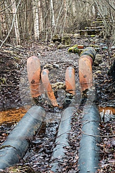 Cut down a rusty metal pipe sticking out