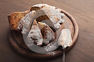 Cut easter yeast cake sprinkled with powdered sugar