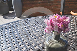 Cut flower vase decorated on table in restaurant