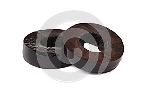 Cut black olives on white background