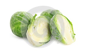Cut fresh Brussels sprouts isolated on white