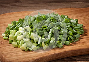 The cut fresh onions lying on the board