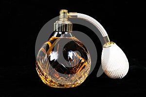 Cut glass perfume atomiser bottle.