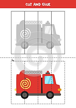 Cut and glue game for kids. Cartoon fire truck.