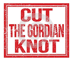 CUT THE GORDIAN KNOT, text on red grungy stamp sign