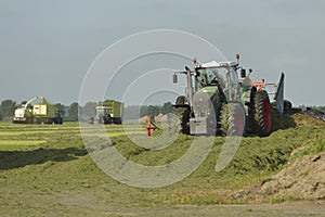 Cut grass chopping and silage with tractors