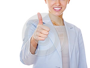 Cut image of a business woman gesturing a thumbs up on white. Cropped image of a business woman giving you an approval