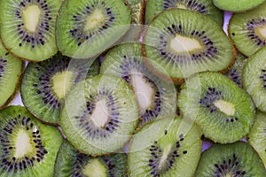 The cut kiwi fruit. Close-up background texture