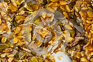 Cut kozinaki made from sunflower seeds and pumpkin seeds