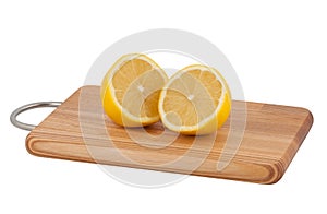 Cut lemon on cutting board.