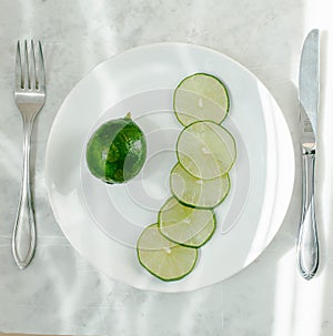 Cut lime on a plate