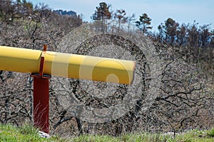 A cut-off yellow gas pipe