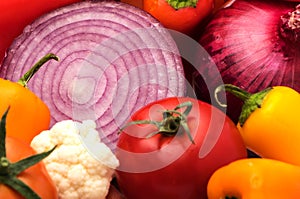 Cut onion and Vegetable Medley for salad with peppers and tomato