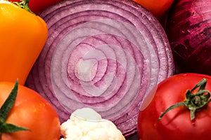 Cut onion and Vegetable Medley for salad with peppers and tomato