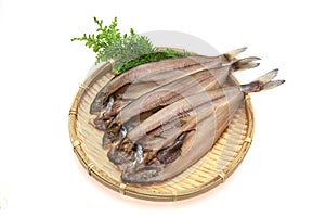 Cut open and dried Atka mackerel in white background