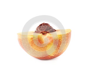 Cut open nectarine half isolated