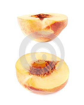 Cut open nectarine half isolated