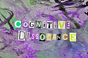 Cut out colored letters from magazines and compilation of cognitive dissonance