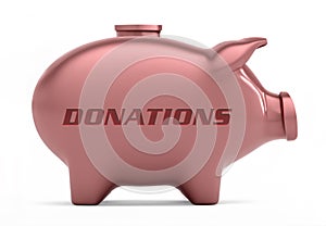 Cut-out object shot of a pink piggy bank with the copy Donations isolated on a white background.