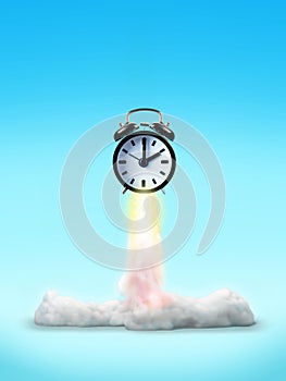 Cut-out object shot of a retro alarm clock rocket launch isolated on a blue background