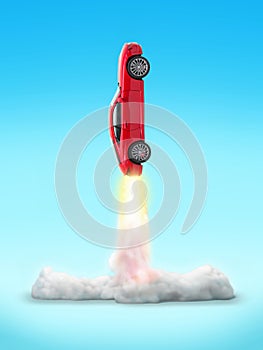 Cut-out object shot of a sports car rocket launch isolated on a blue background