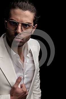 cut out picture of sexy fashion man holding white jacket suit