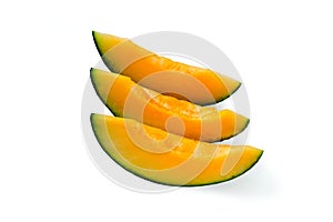 Cut pieces of ripe yellow melon. Seedless. Isolated
