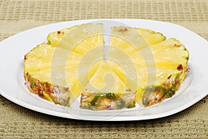 Cut Pineapple On A Plate