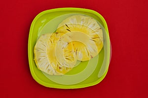 Cut Pineapple Plate with white background , photo , image .